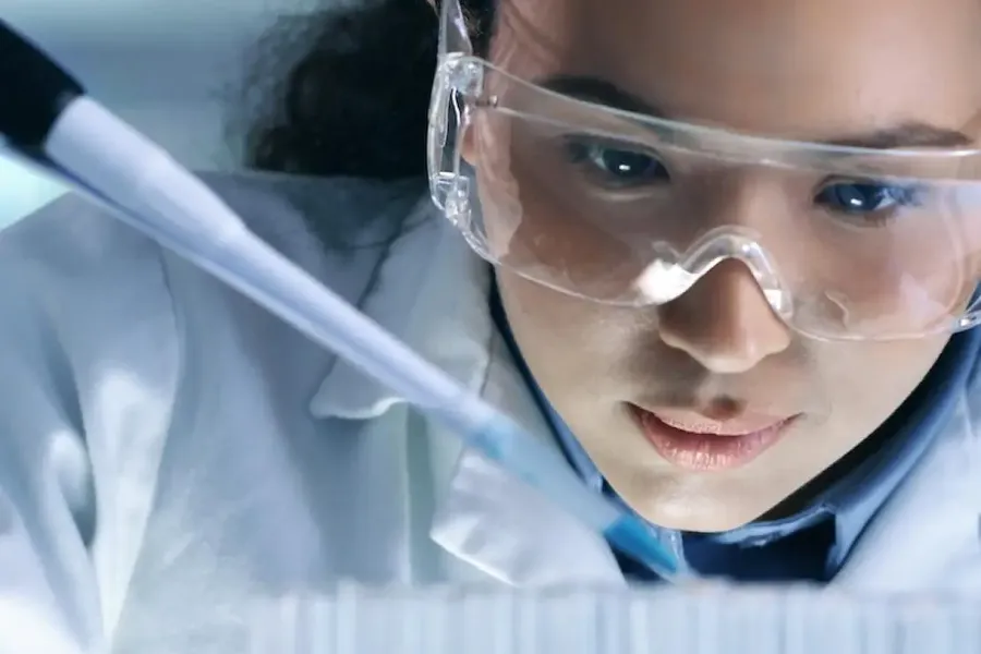 Woman testing in lab